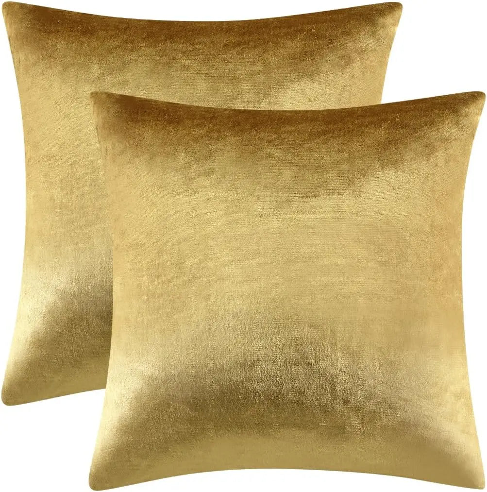 Set of 2 gold velvet 18x18 decorative throw pillow covers on couch