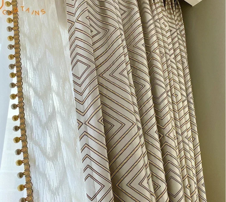 Gray diamond jacquard blackout curtains hanging in a modern living room