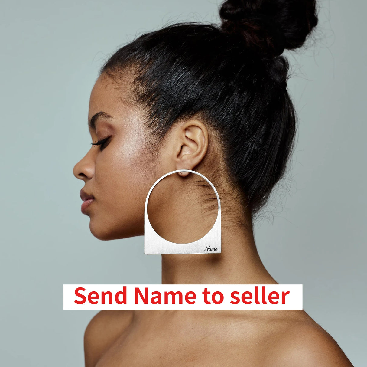 Model using silver African Large Hoop Earring