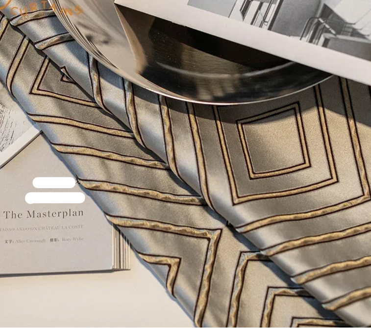 Gray diamond jacquard blackout curtains hanging in a modern living room