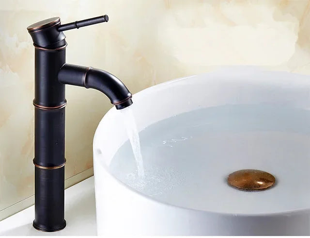 Black bronze bamboo-style waterfall basin faucet with single lever mixer