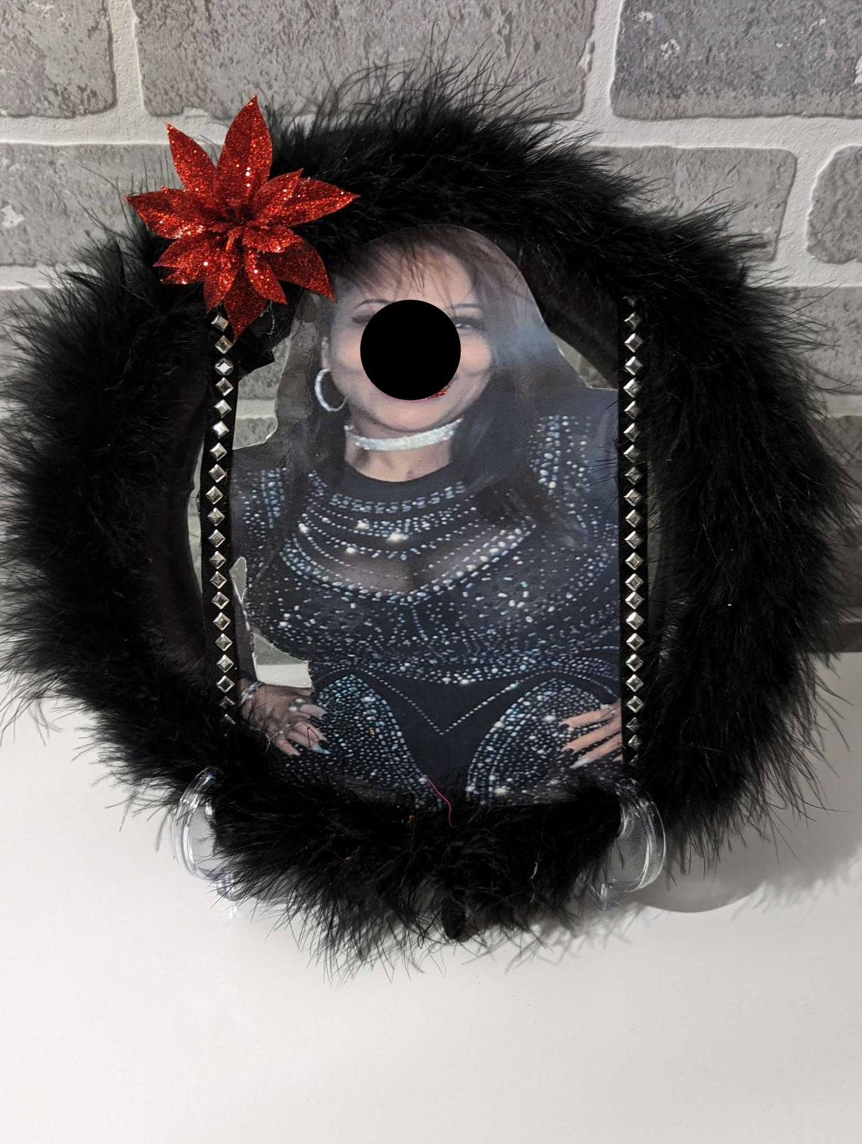 Black Red Poinsettia Flower Design Lady Wreath set on the table