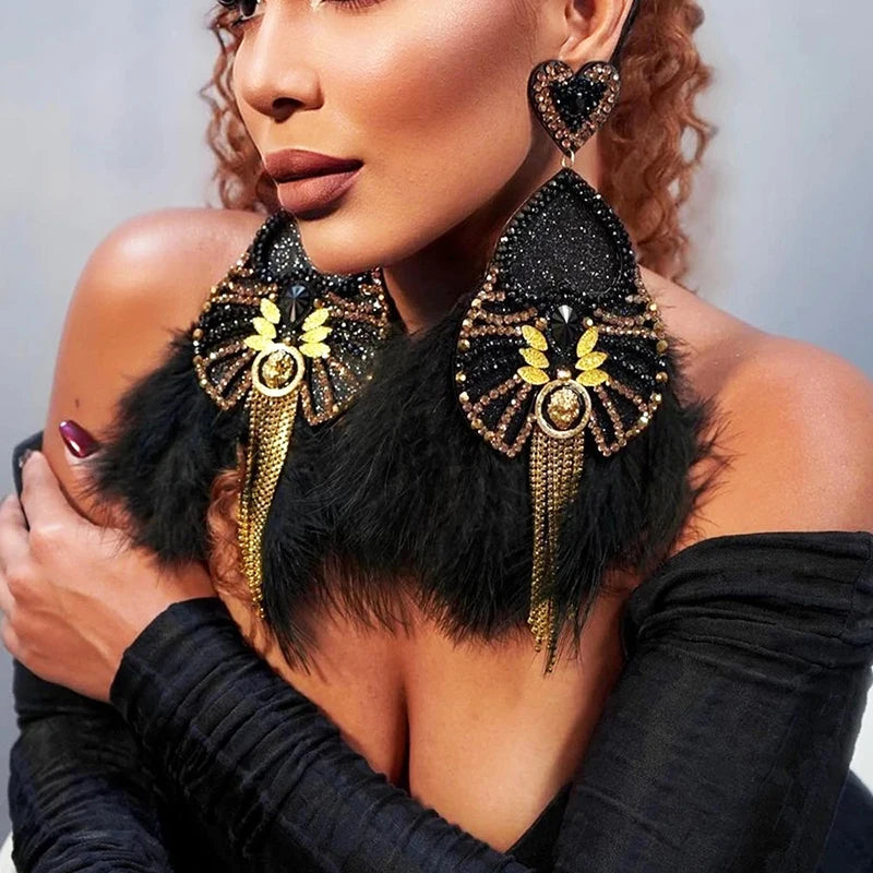 model using black Boho-Chic Statement Feather Drag Earrings