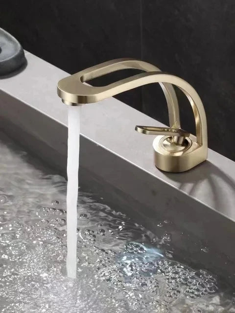 Brass bathroom basin mixer faucet with single handle in brushed gold
