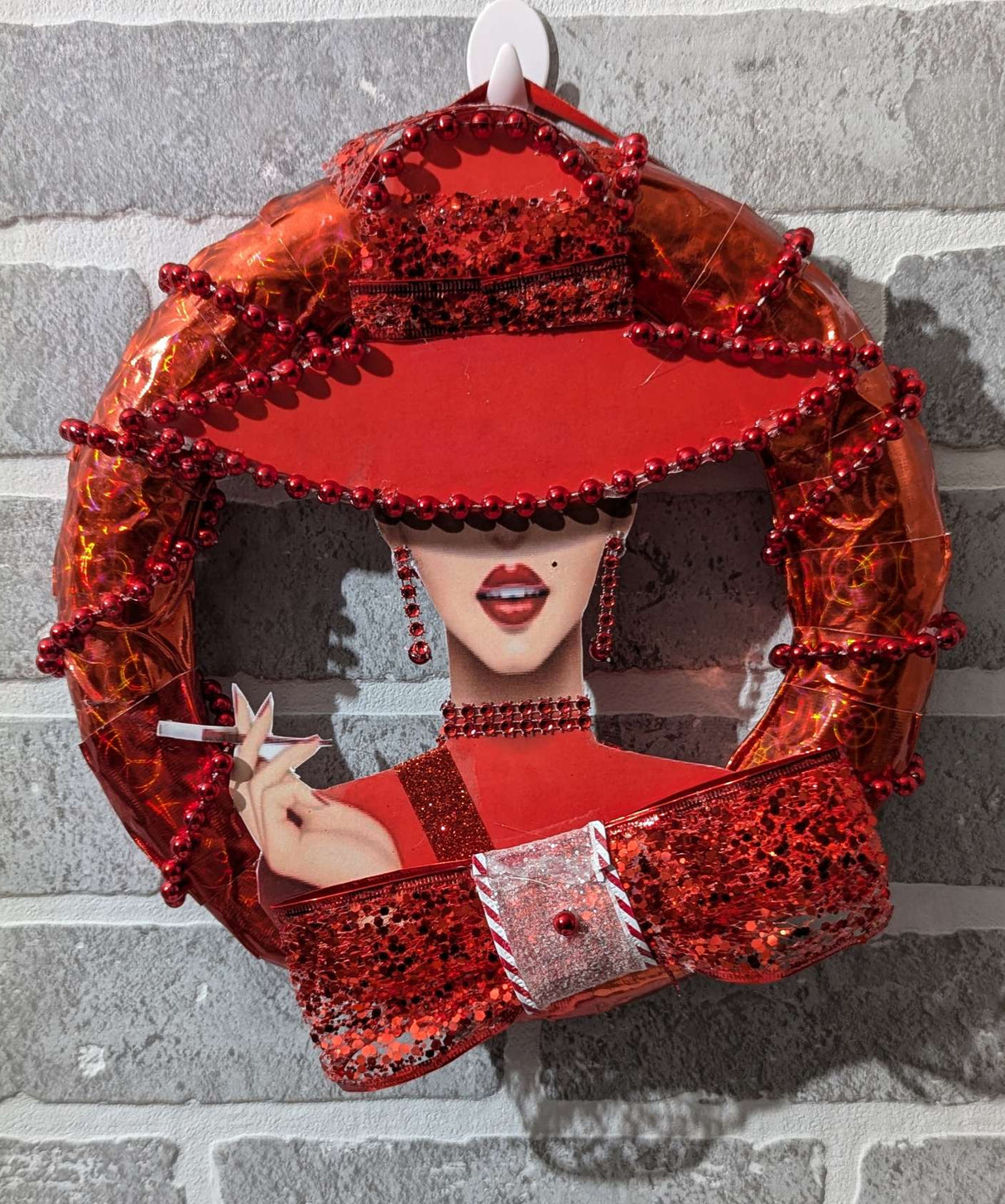Custom Lady Red Wreath hung on the wall