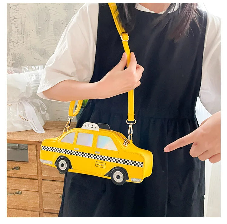 Model using Cute Cartoon Yellow Taxi Shape Shoulder Bag