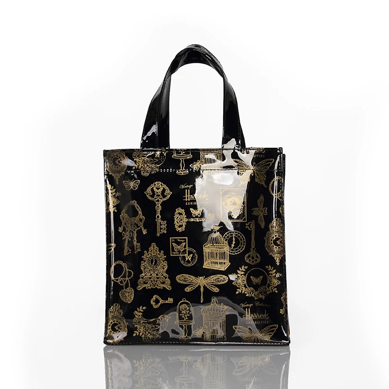 gold print design black tote bag