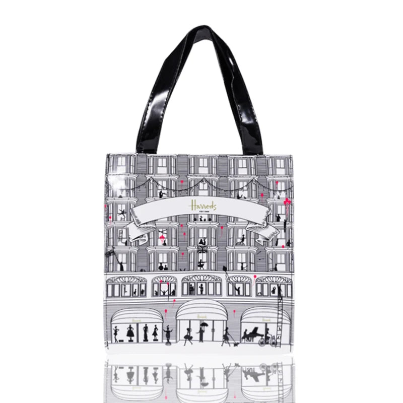 silver bag black strap tote bag
