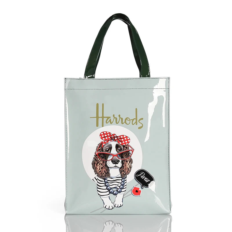 gray bag with black strap, dog printed design name harrods eco friendly tote bag