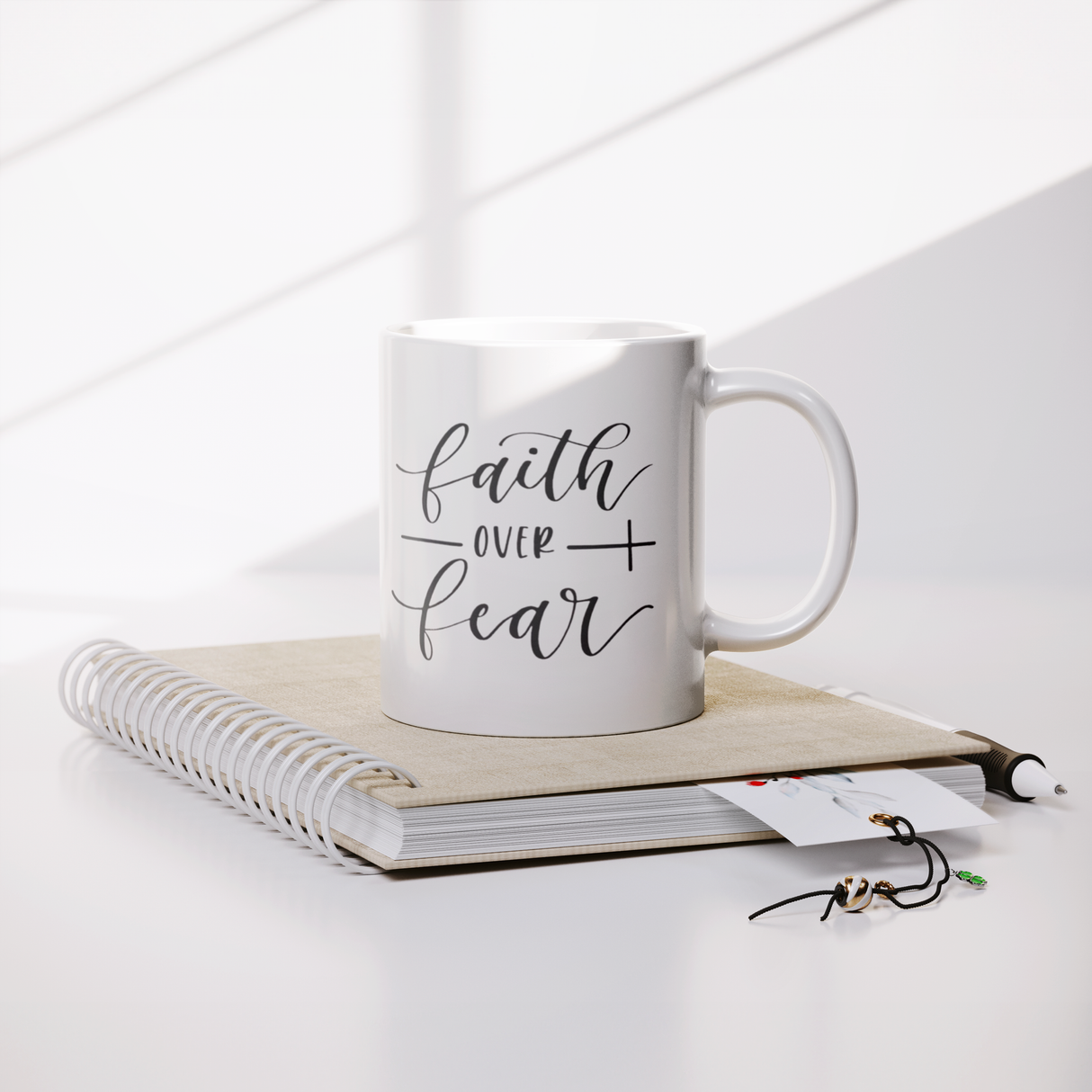 Faith_Over_Faith-1_Lifestyle_Notebook_Mockup.png