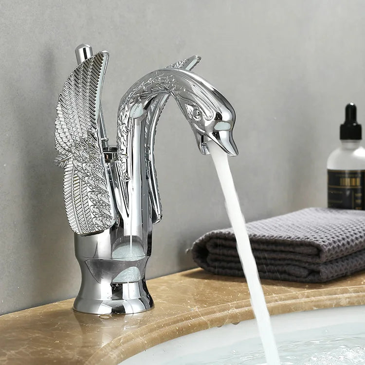 Golden swan-shaped deck-mounted basin faucet with single handle for hot and cold water