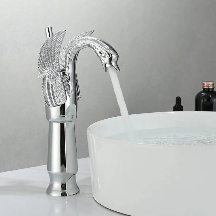 Golden swan-shaped deck-mounted basin faucet with single handle for hot and cold water