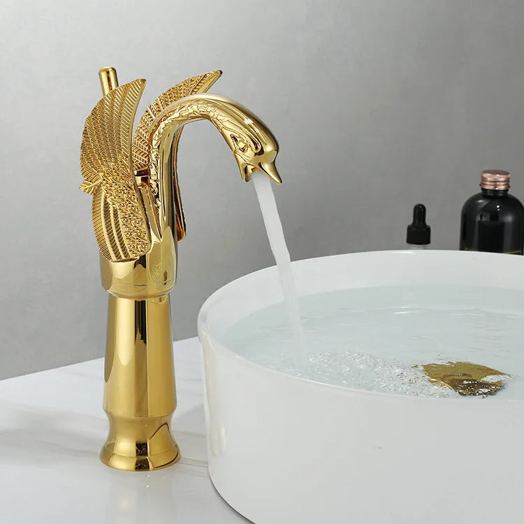 Golden swan-shaped deck-mounted basin faucet with single handle for hot and cold water