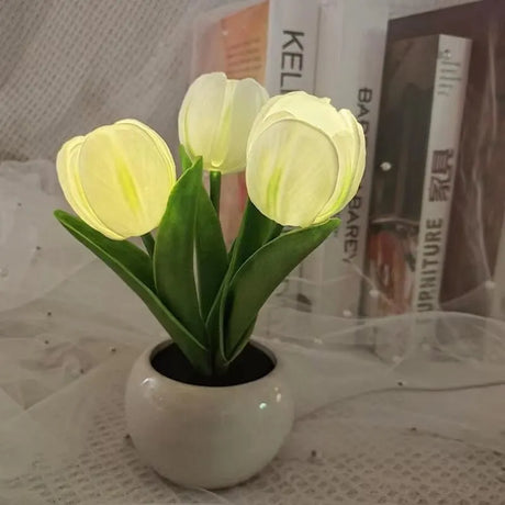 ED tulip table lamp with flower bouquet design on bedside table