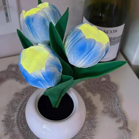 ED tulip table lamp with flower bouquet design on bedside table