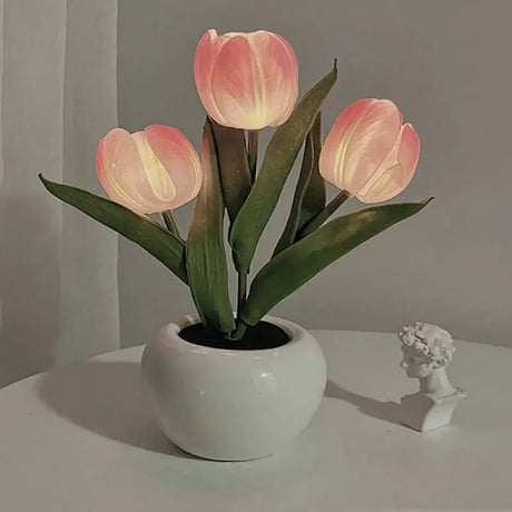 ED tulip table lamp with flower bouquet design on bedside table