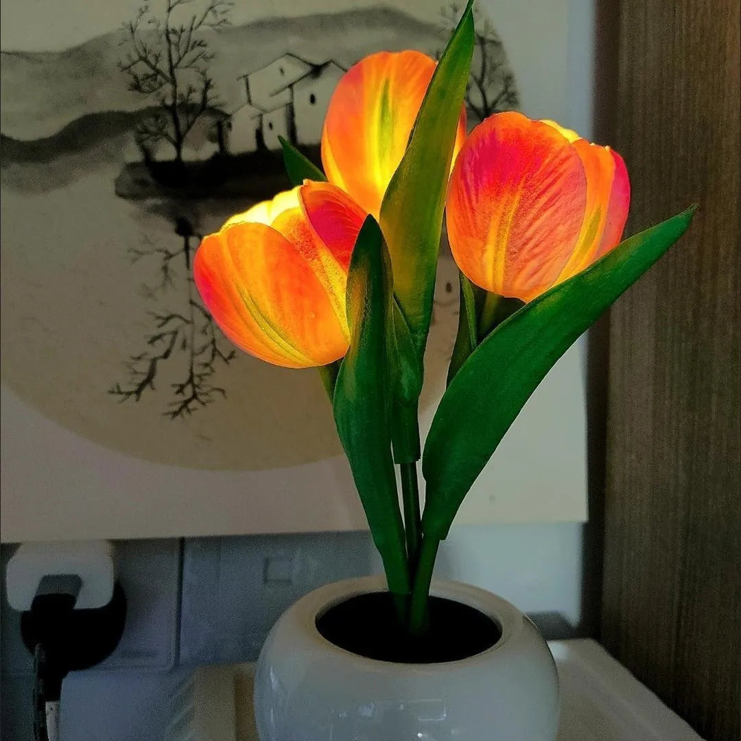 ED tulip table lamp with flower bouquet design on bedside table