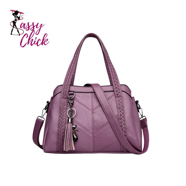 purple handbag sassy chick logo