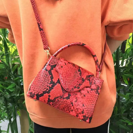 Model Using Luxury Snake and Ostrich Leather Handbag