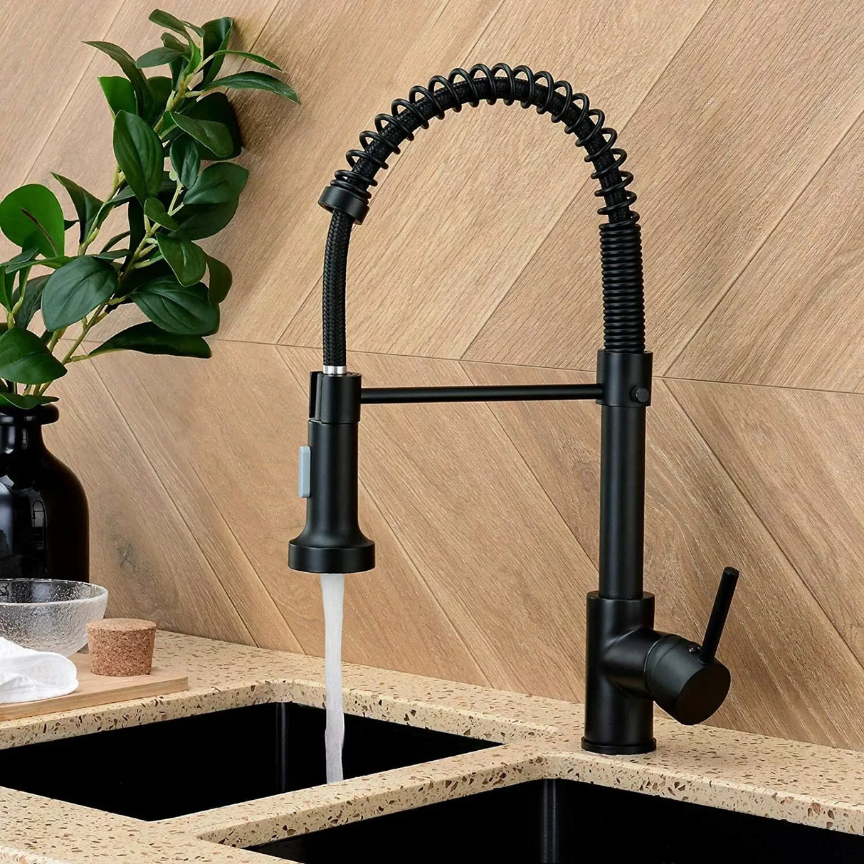 Matte black spring kitchen faucet with single handle and hot/cold water mixer