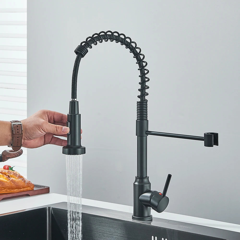 Matte black spring kitchen faucet with single handle and hot/cold water mixer