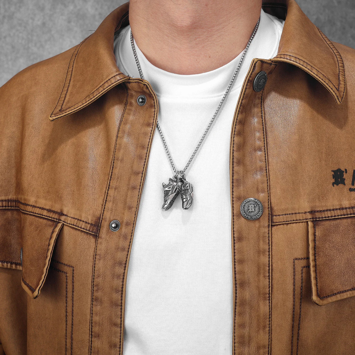 model using Retro Basketball Shoes Pendant Stainless Steel Jewelry