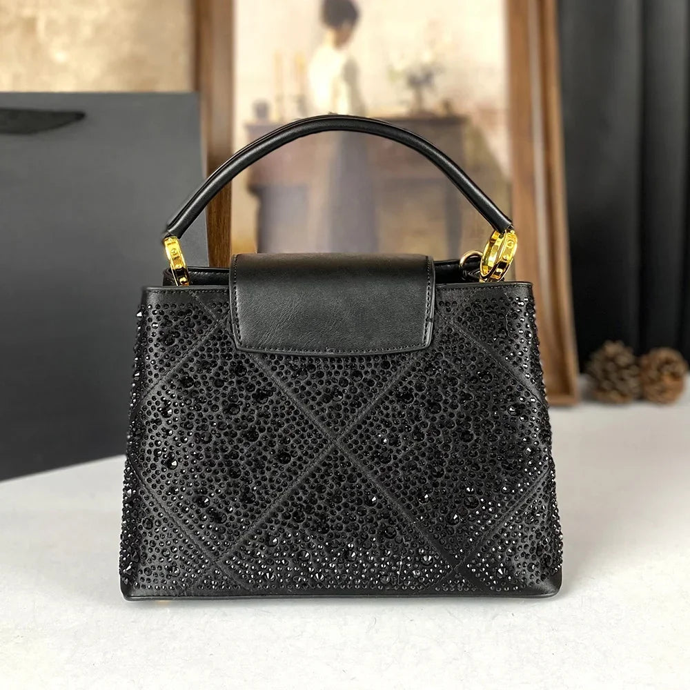 Back view of black Rivet Water Diamond Style Handbag