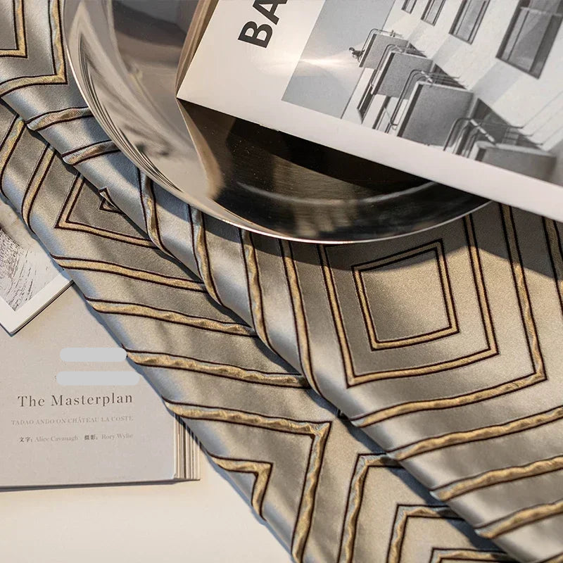 Gray diamond jacquard blackout curtains hanging in a modern living room