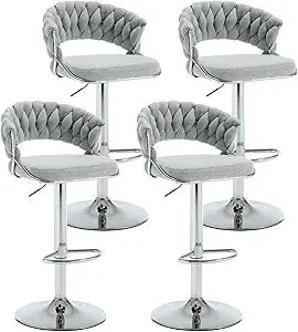 Set of 4 modern velvet swivel bar stools with low back and adjustable height on golden base