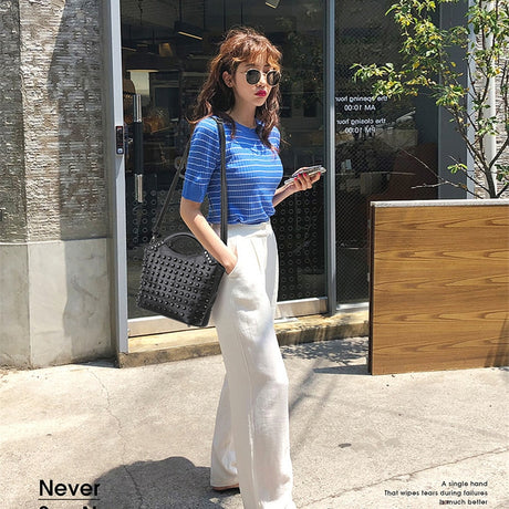 Model using Sheepskin Leather Rivet Handbag