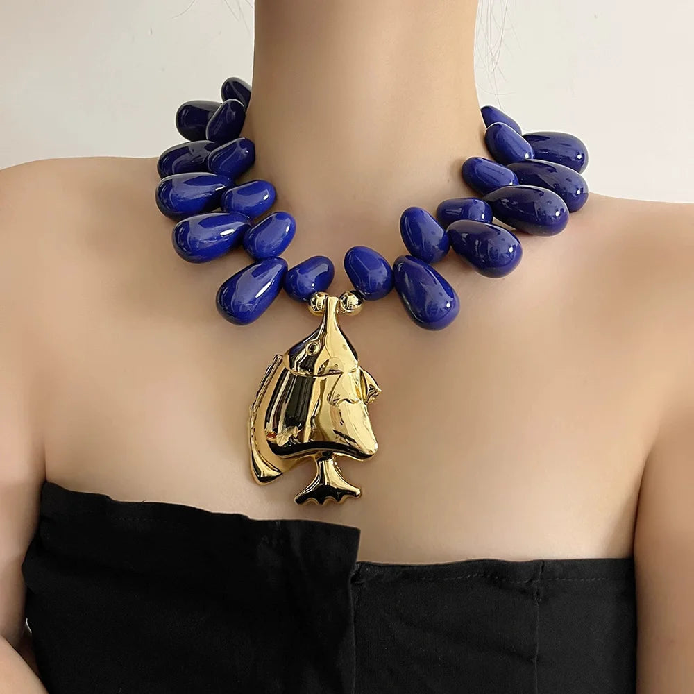 Model Using Small Fish Pendant Beaded Necklace