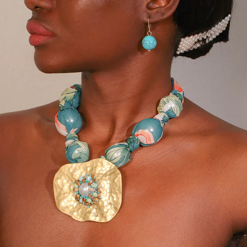 Model using Statement Beads with Geometry Pendant Jewelry