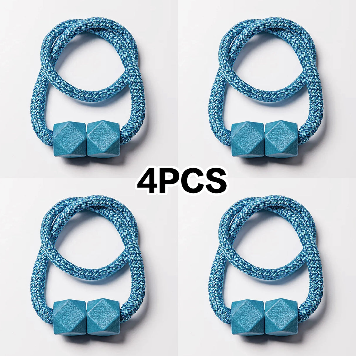 Set of 4 magnetic curtain tiebacks with thick rope design in a living room