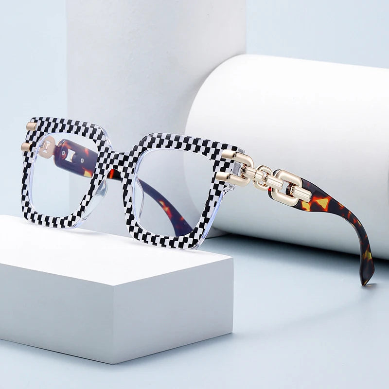Women's large frame blue light glasses with gold chain detail