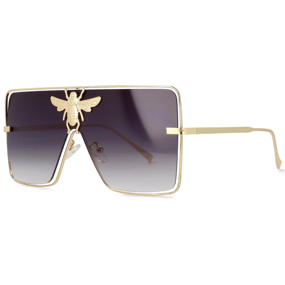 Luxury square metal sunglasses with UV400 protection and bold fashion frame for women.