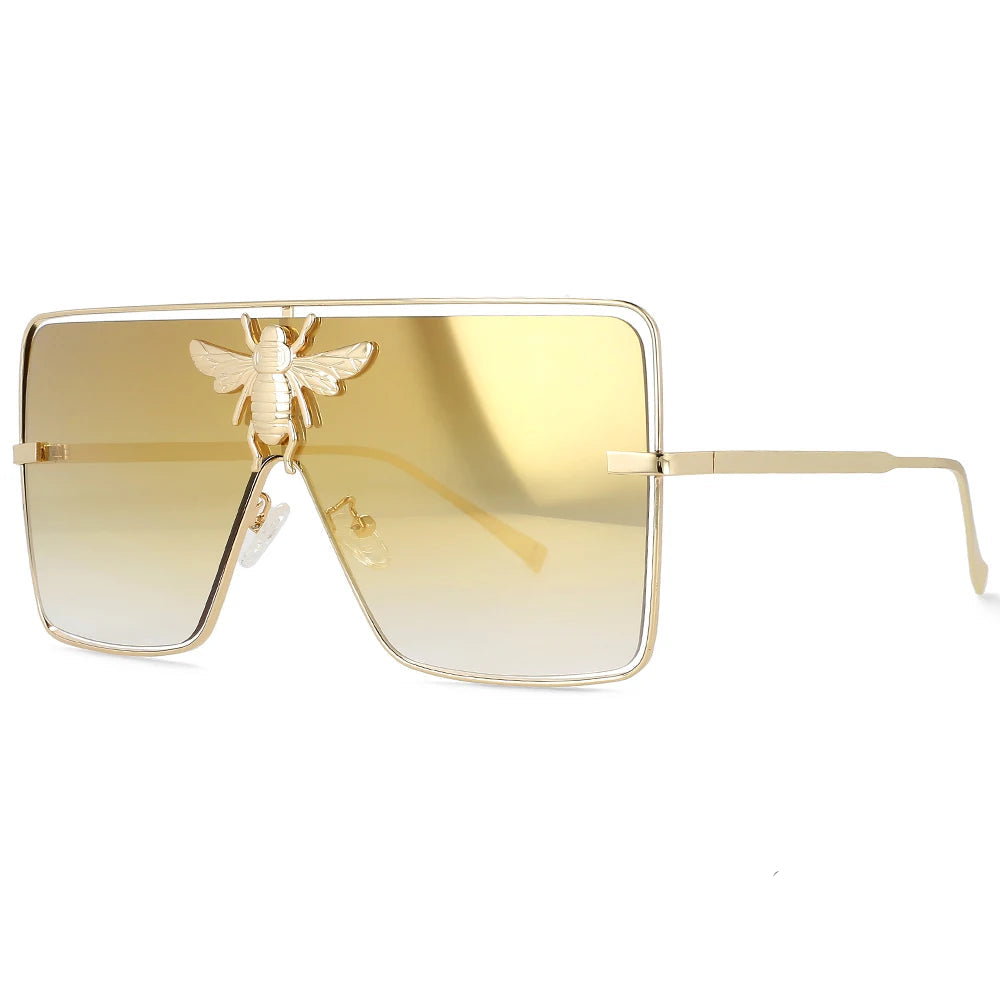Luxury square metal sunglasses with UV400 protection and bold fashion frame for women.