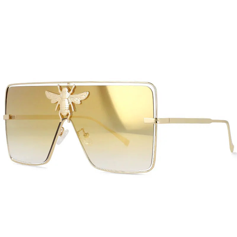 Luxury square metal sunglasses with UV400 protection and bold fashion frame for women.
