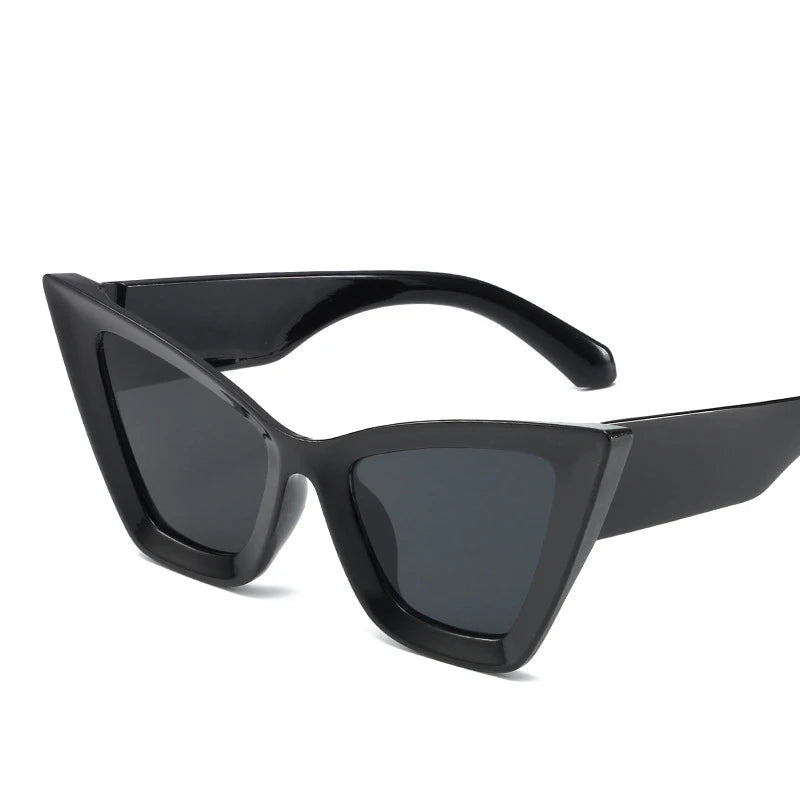 Vintage cat-eye sunglasses with square frame design for women, retro fashion eyewear for outdoor and everyday style.