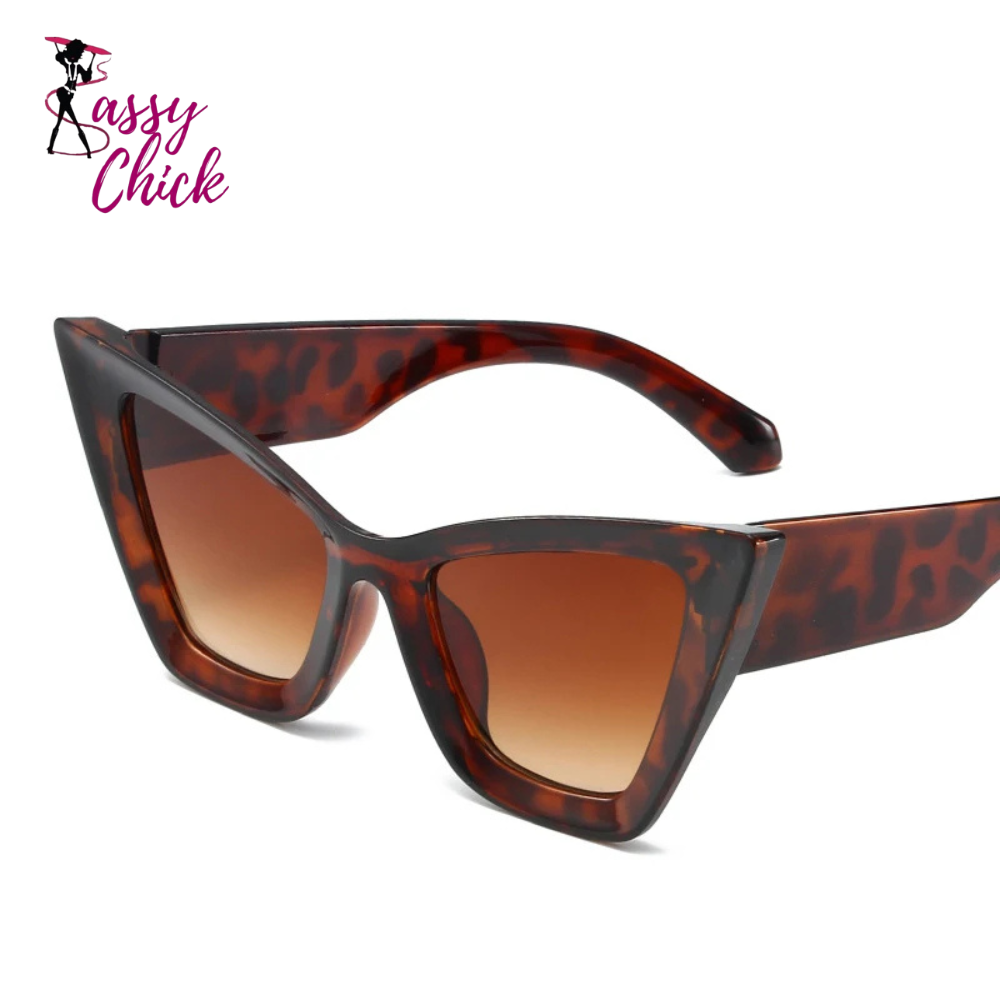 Vintage cat-eye sunglasses with square frame design for women, retro fashion eyewear for outdoor and everyday style.