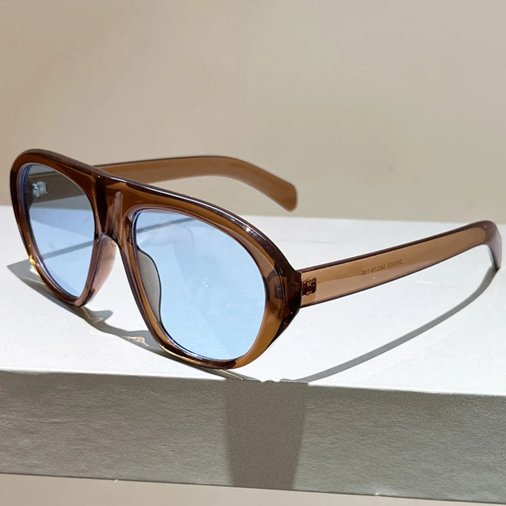 Women’s vintage sunglasses in black and red elegant design, trendy retro outdoor fashion eyewear with UV400 protection.