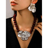 Model Using 3D Floral Beaded Exaggerated Metallic Jewelry Set