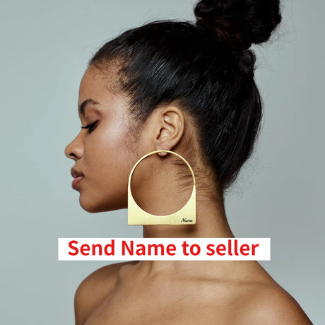 Model using gold African Large Hoop Earring