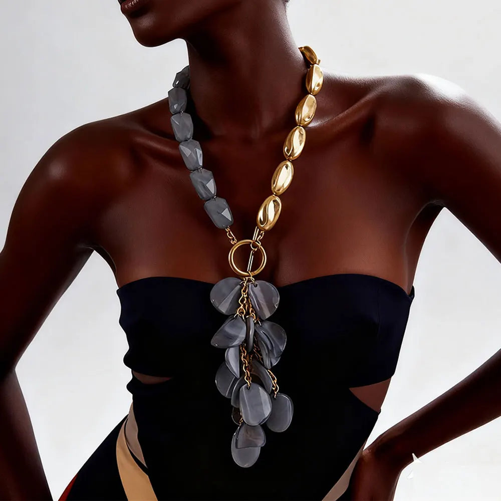 Model Using Asymmetric Gold Tone Gray Beaded Tassel Statement Necklace