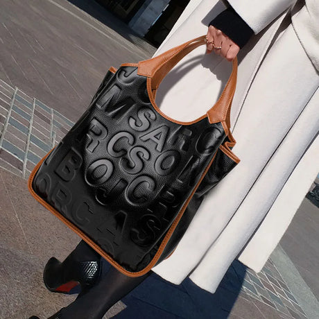 Model using Black Letter Style Large Handbag