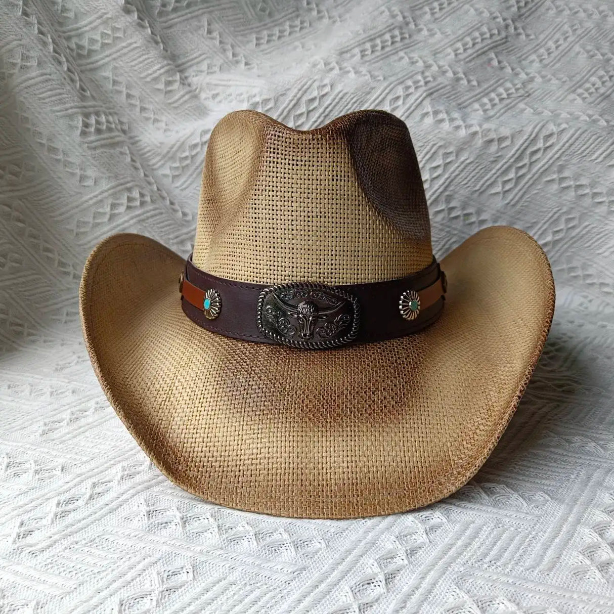 Brown cowboy straw hat