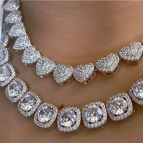Model using Bling Heart-Shaped Cuban Necklace