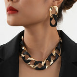 Model Using Chunky Link Chain Choker Necklace and Earrings