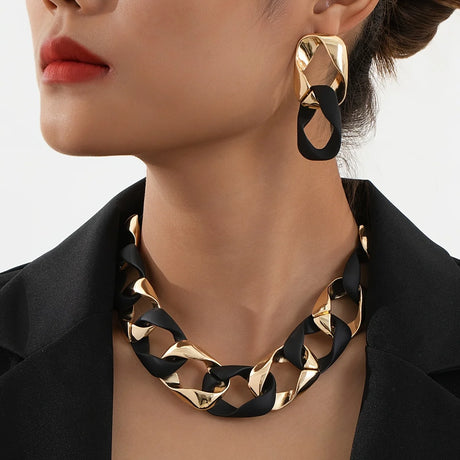 Model Using Chunky Link Chain Choker Necklace and Earrings