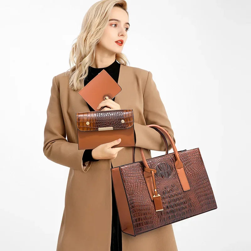 model holding pouch wallet and brown handbag