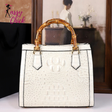 Crocodile Patterned Middle Aged Bamboo Joint Handbag Sassy Chick Logo